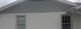 The same weatherboard wall after a house wash